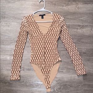 sparkly rose gold body suit